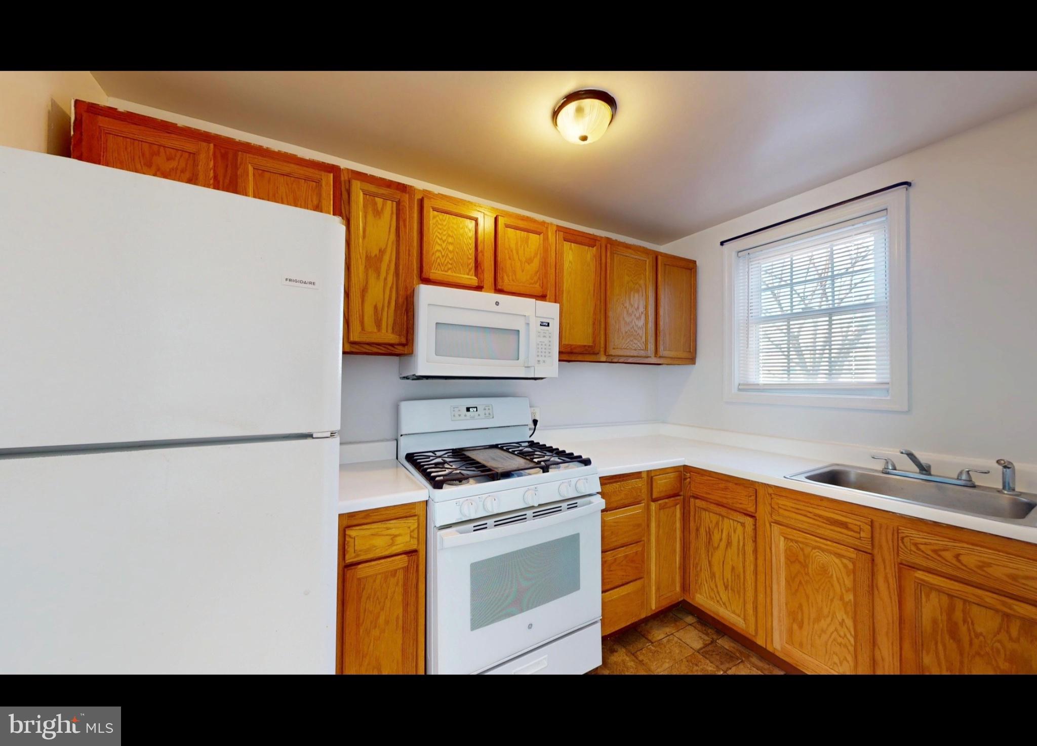 944 1st Street Brooklyn, MD 21225 - Photo 3 of 17 Bright and inviting kitchen space.
