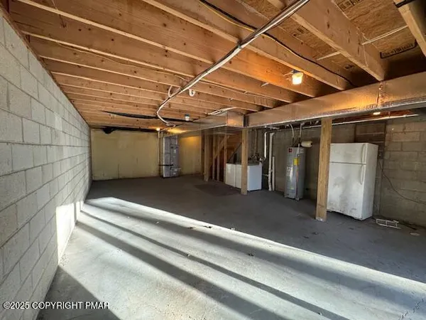 a view of storage and utility room