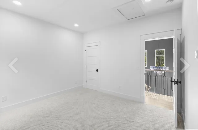 a bathroom with a double vanity sink toilet mirror and bathtub