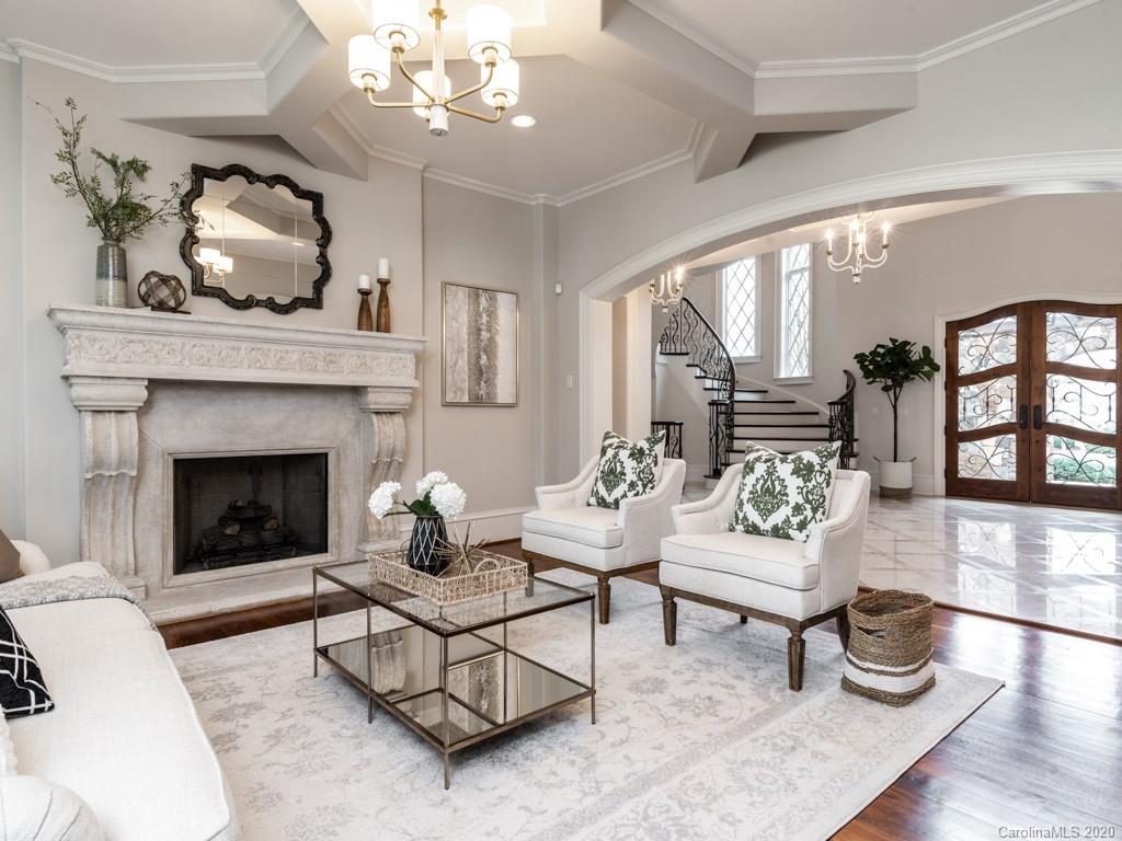 404 Eagle Bend Drive Waxhaw, NC 28173 - Photo 12 of 46 a living room with furniture and a fireplace