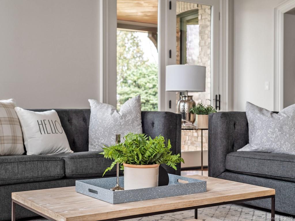 404 Eagle Bend Drive Waxhaw, NC 28173 - Photo 25 of 46 a living room with furniture and a potted plant