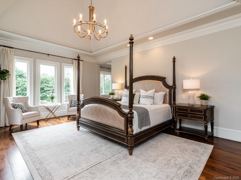 404 Eagle Bend Drive Waxhaw, NC 28173 - Photo 27 of 46 a bedroom with a bed wooden floor and window