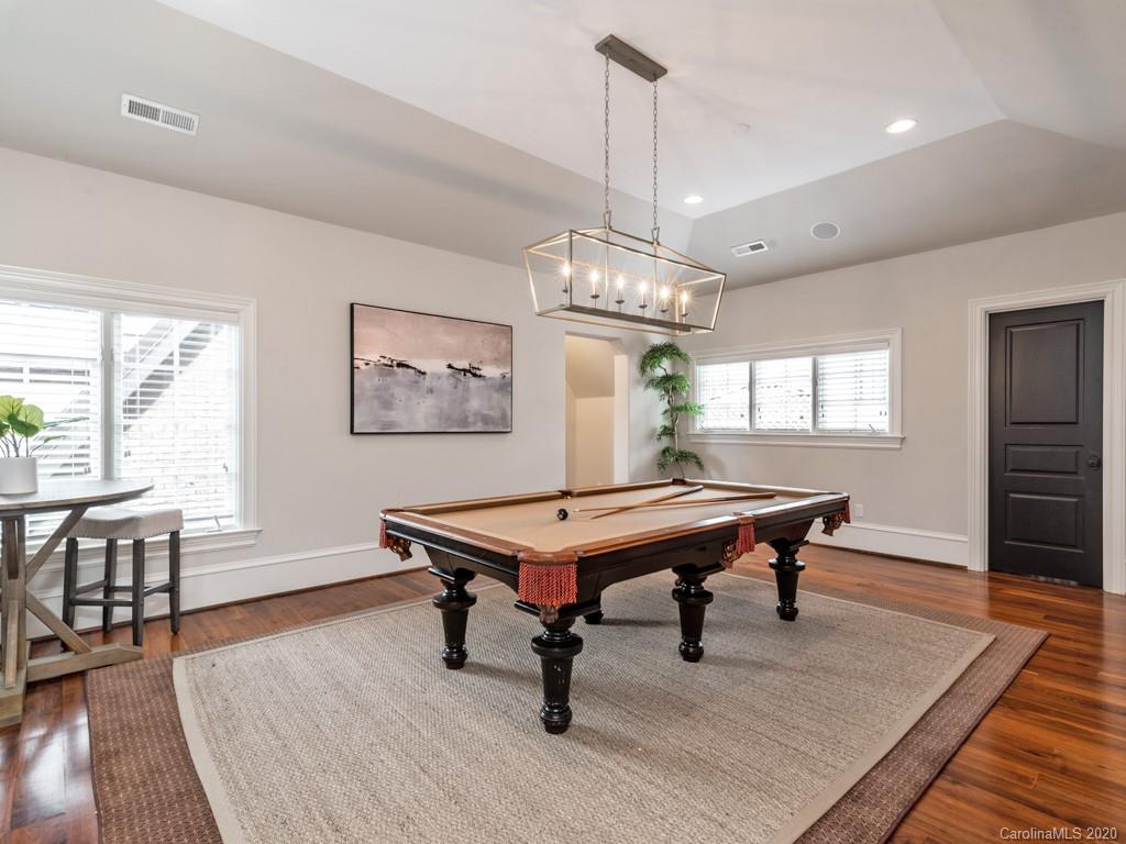 404 Eagle Bend Drive Waxhaw, NC 28173 - Photo 35 of 46 a room with pool table and windows