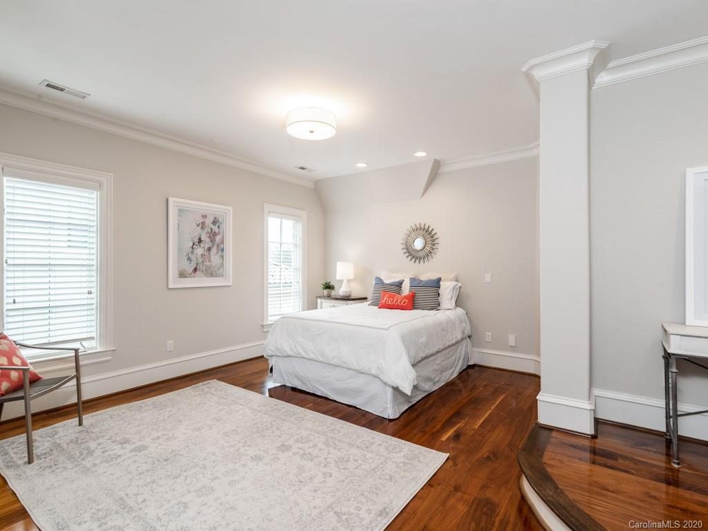 404 Eagle Bend Drive Waxhaw, NC 28173 - Photo 40 of 46 a room with two bed and a window