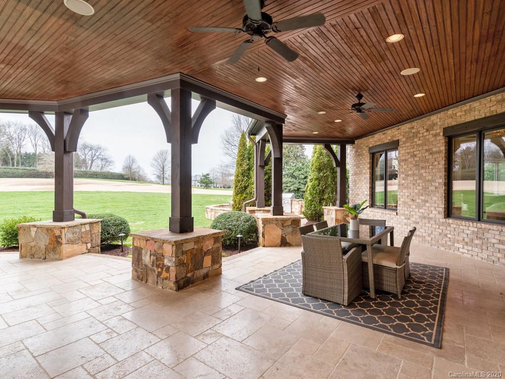 404 Eagle Bend Drive Waxhaw, NC 28173 - Photo 42 of 46 a living room with furniture and large windows