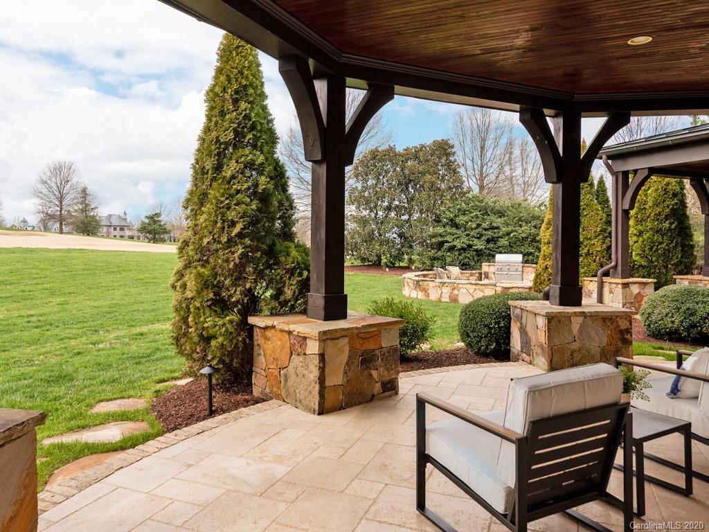 404 Eagle Bend Drive Waxhaw, NC 28173 - Photo 43 of 46 a balcony with furniture and a garden