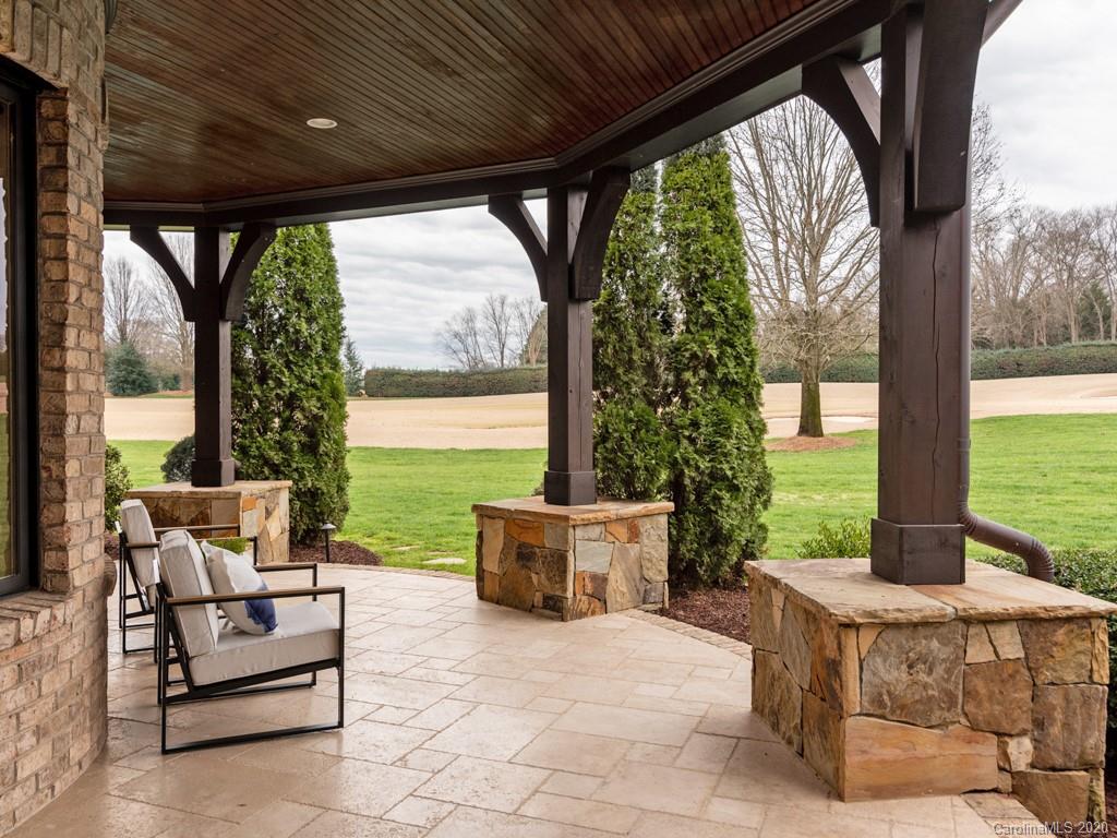 404 Eagle Bend Drive Waxhaw, NC 28173 - Photo 44 of 46 a outdoor space with patio couch and wooden floor