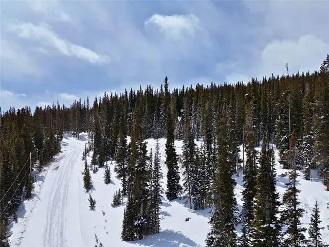 a view of a city with lots of trees
