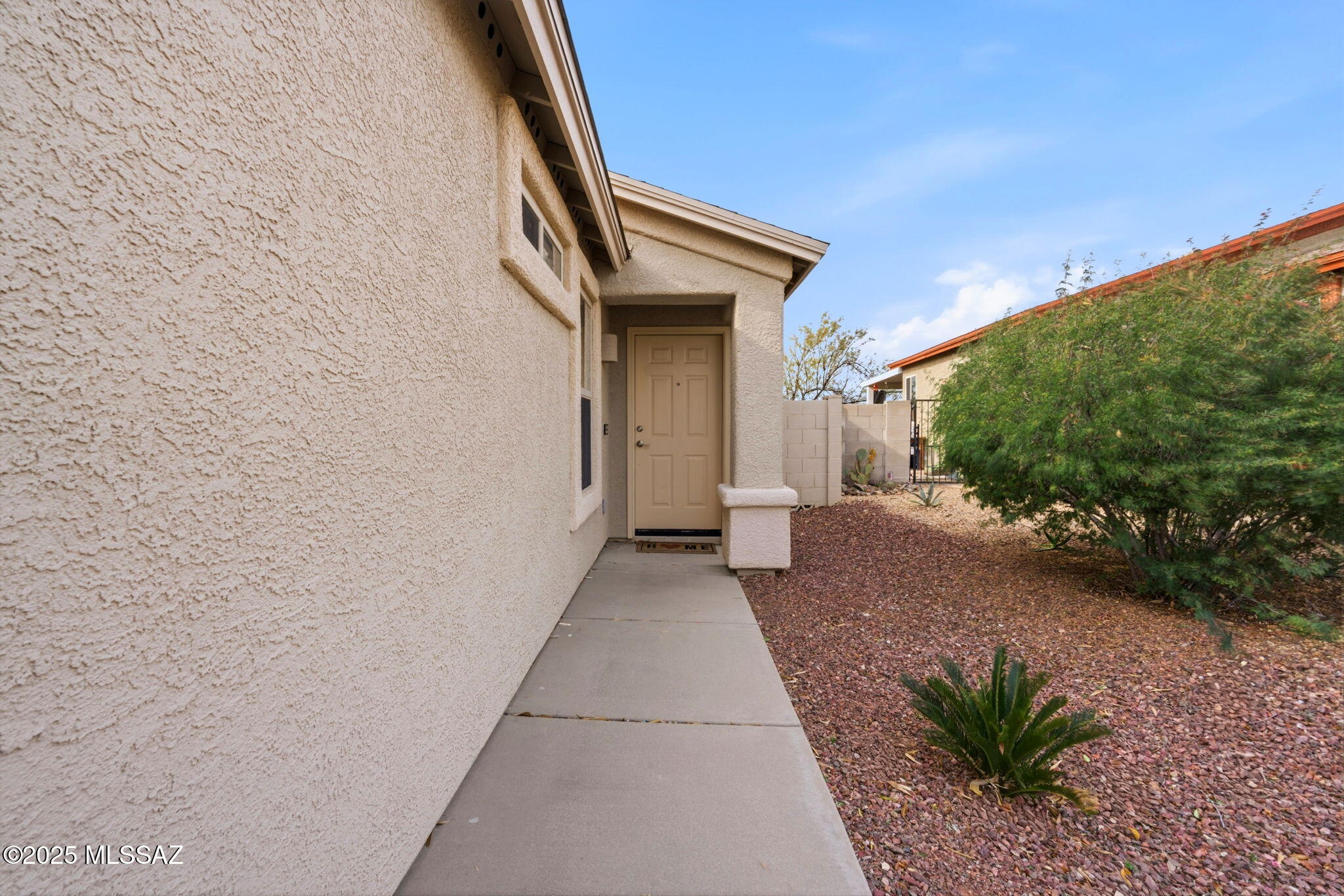 8244 South Lost Mountain Road Tucson, AZ 85747 - Photo 2 of 41 a view of a house with a yard
