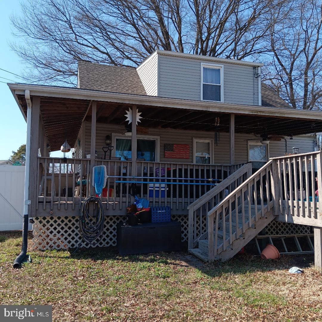 33 Left Wing Drive Baltimore, MD 21220 - Photo 5 of 17 a view of a house with wooden deck and furniture