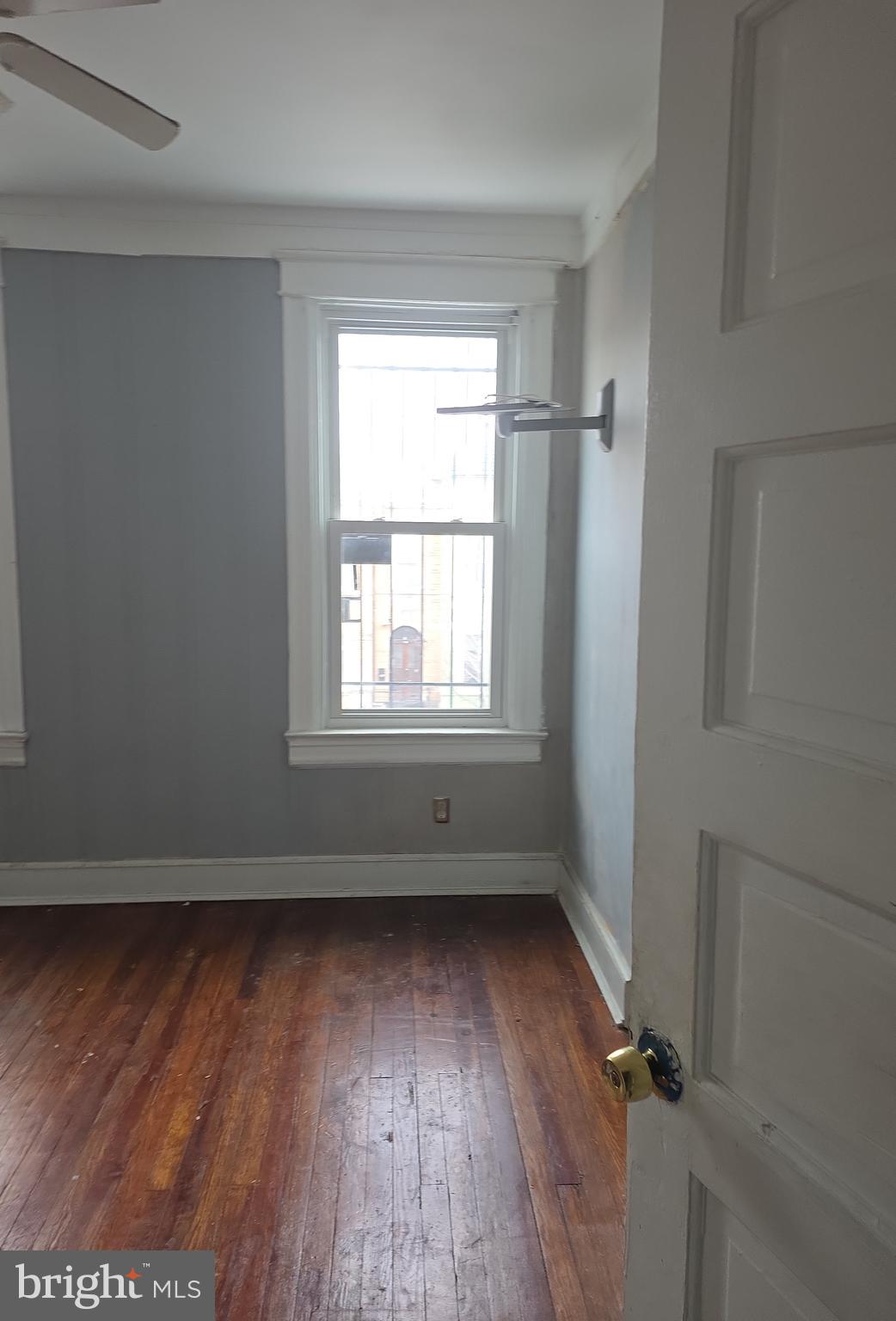 38 N Street Northwest Washington, DC 20001 - Photo 17 of 20 an empty room with wooden floor and windows