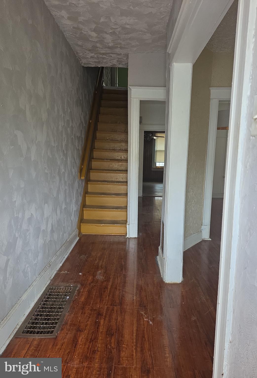 38 N Street Northwest Washington, DC 20001 - Photo 2 of 20 a view of a hallway with wooden floor and staircase