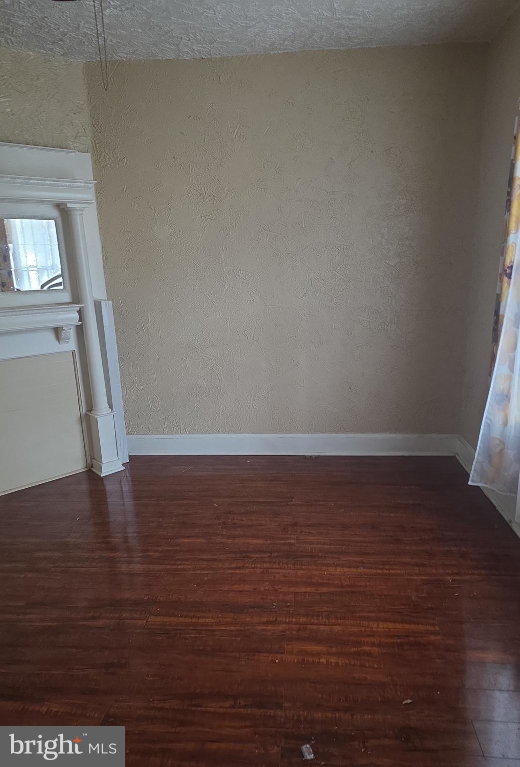 38 N Street Northwest Washington, DC 20001 - Photo 3 of 20 a view of a room with wooden floor and a window
