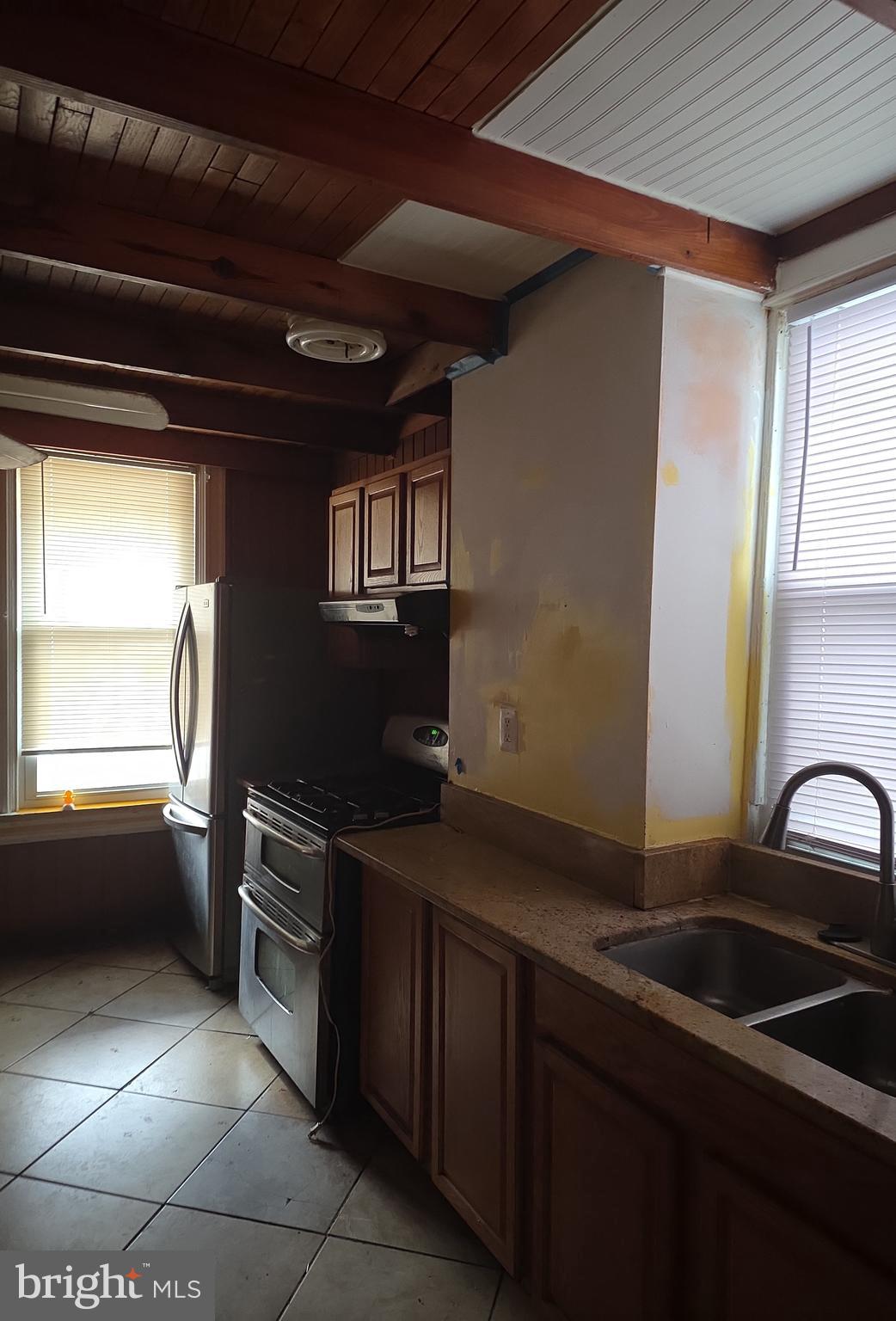 38 N Street Northwest Washington, DC 20001 - Photo 8 of 20 a kitchen with granite countertop a sink stainless steel appliances and cabinets