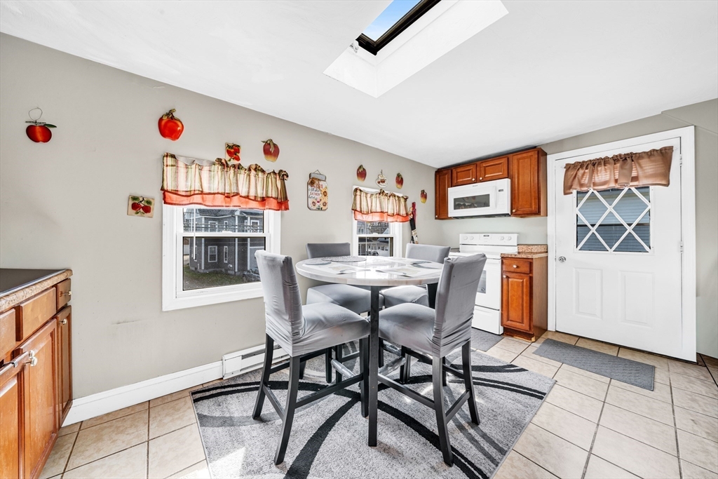 107 Apsley Street Hudson, MA 01749 - Photo 16 of 26 a workspace with furniture and window