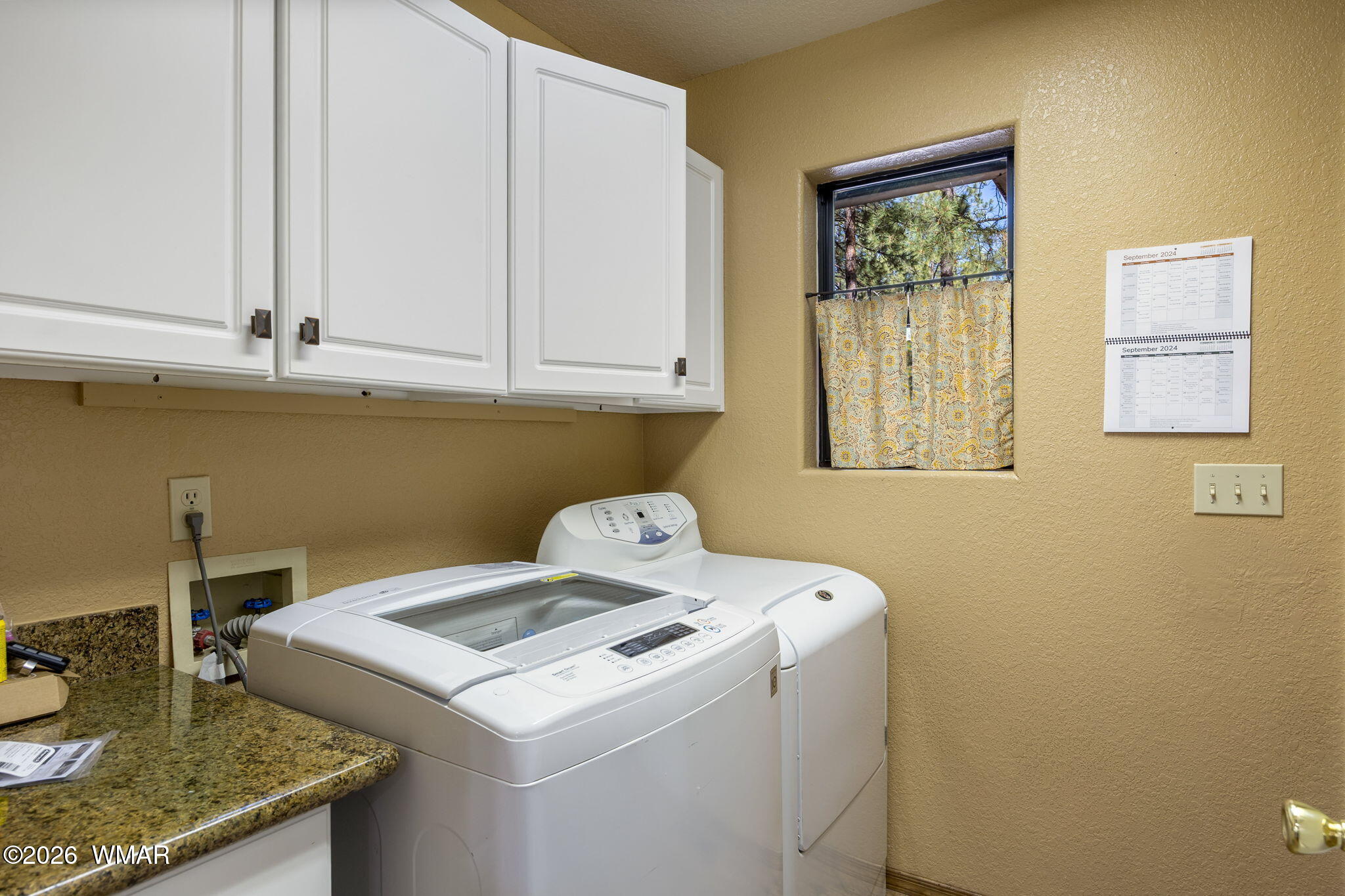 6735 Sunset Trail Pinetop, AZ 85935 - Photo 21 of 33 a utility room with dryer and washer