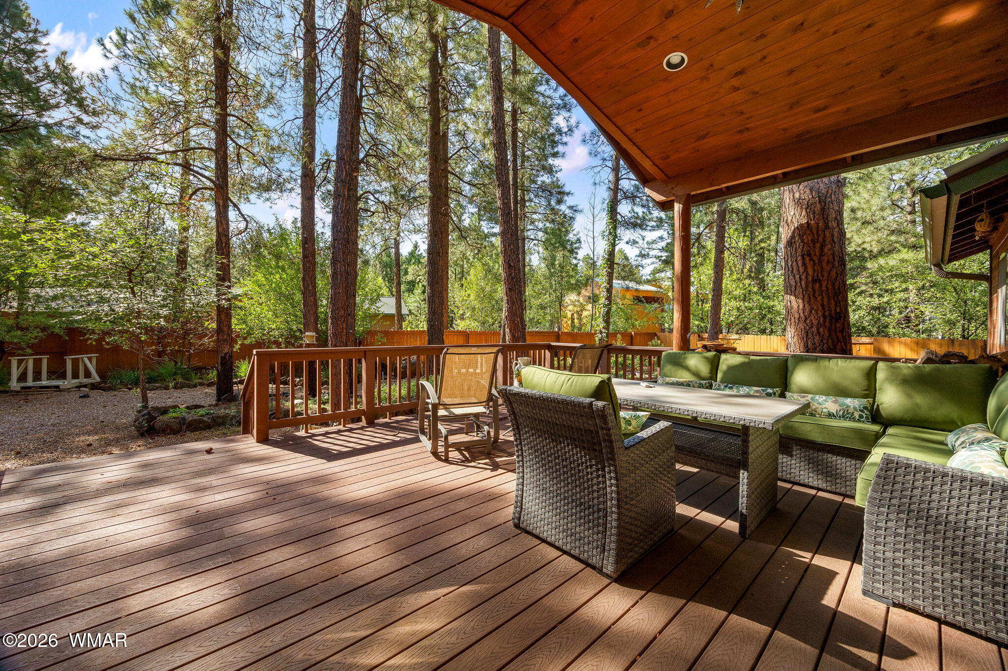 6735 Sunset Trail Pinetop, AZ 85935 - Photo 23 of 33 a roof deck with couches and wooden floor