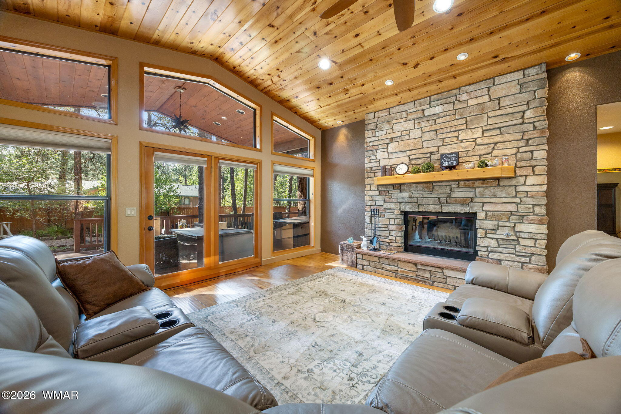 6735 Sunset Trail Pinetop, AZ 85935 - Photo 7 of 33 a living room with furniture window and a fireplace