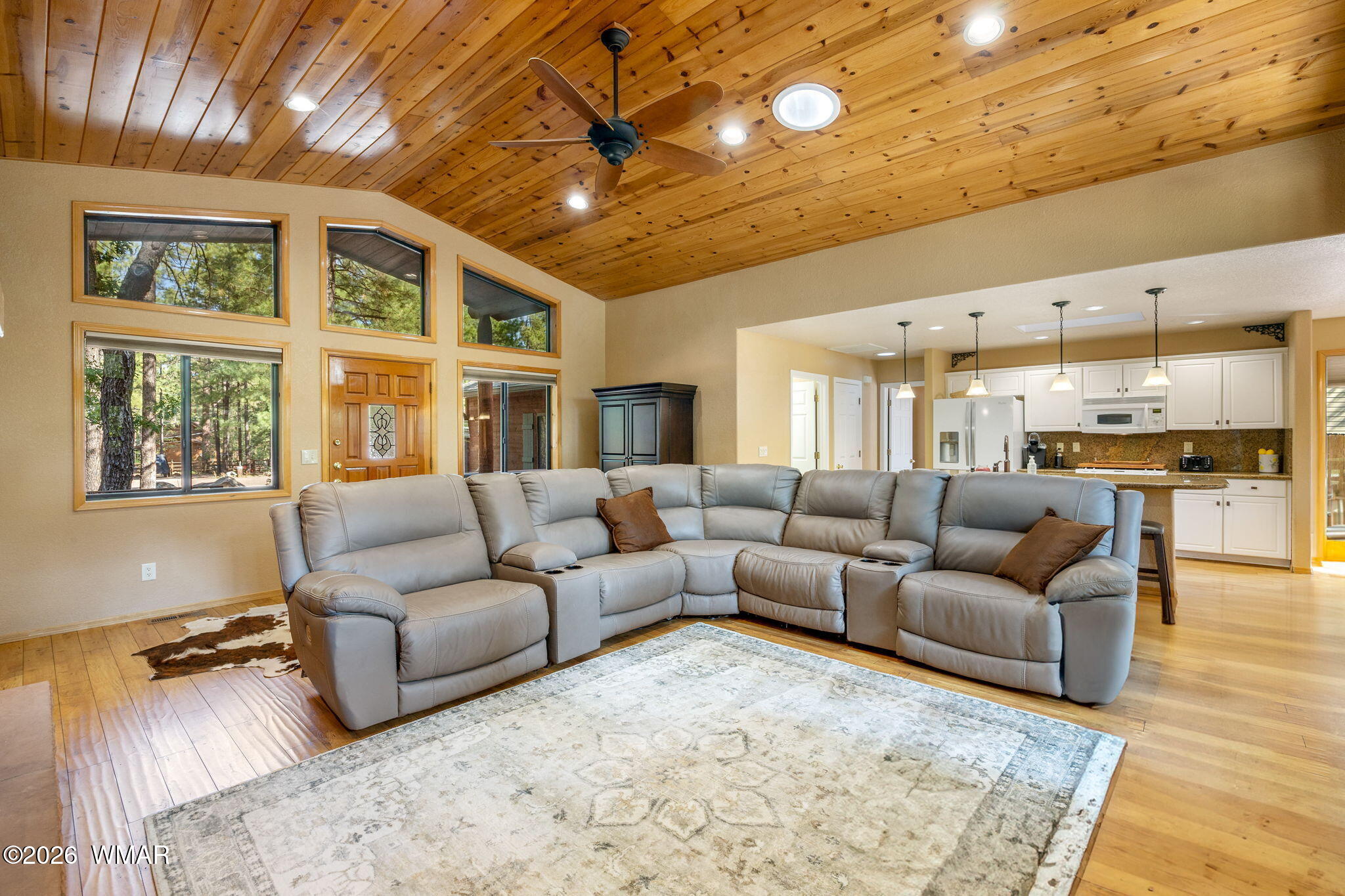 6735 Sunset Trail Pinetop, AZ 85935 - Photo 8 of 33 a living room with furniture and a large window