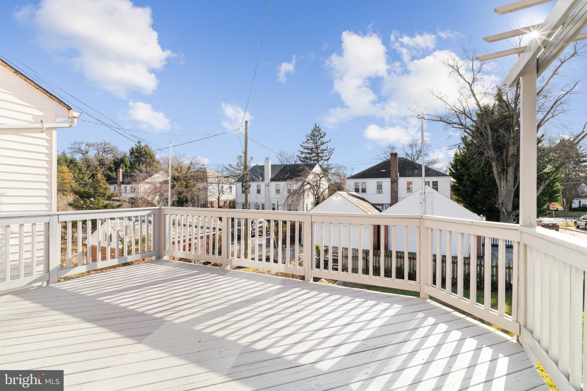 201 Ridge Avenue Towson, MD 21286 - Photo 11 of 40 Spacious deck with walk-down steps to the backyard
