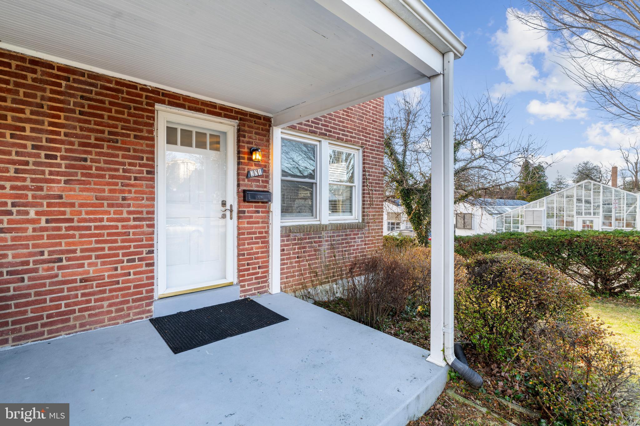 201 Ridge Avenue Towson, MD 21286 - Photo 3 of 40 Covered front porch with storm door.