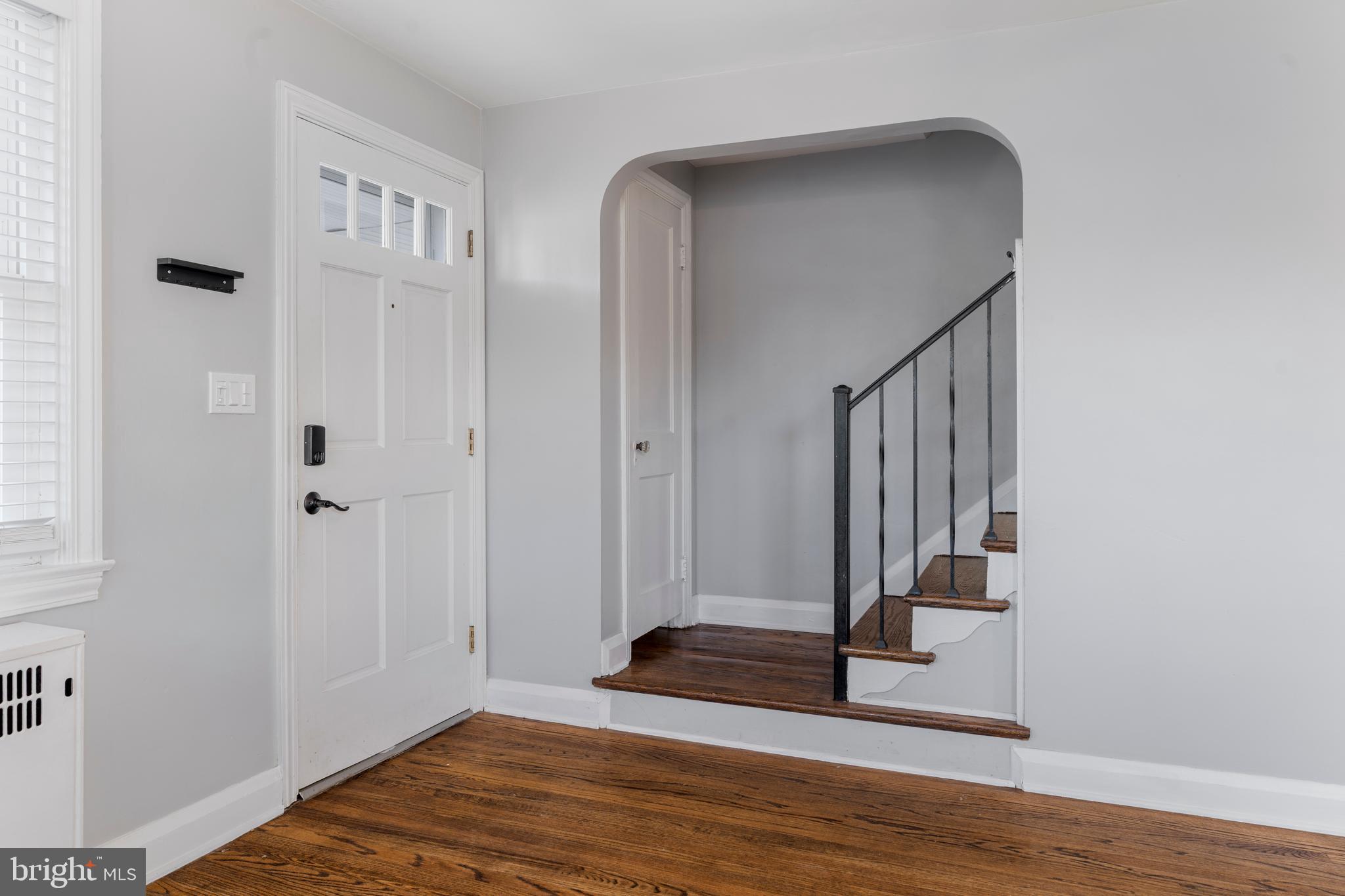201 Ridge Avenue Towson, MD 21286 - Photo 7 of 40 Stairs leading to upper level and front door.
