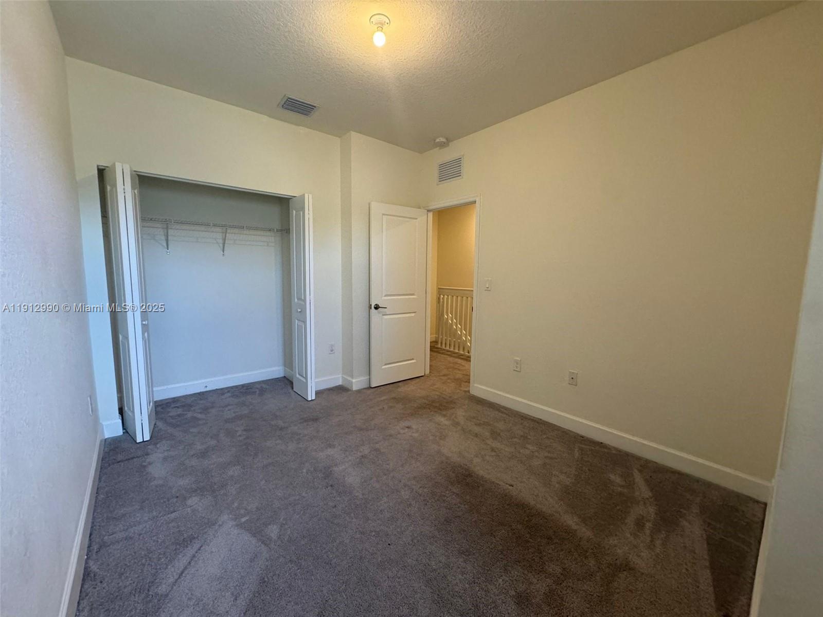 11325 West 34th Way Hialeah, FL 33018 - Photo 13 of 46 a view of an empty room