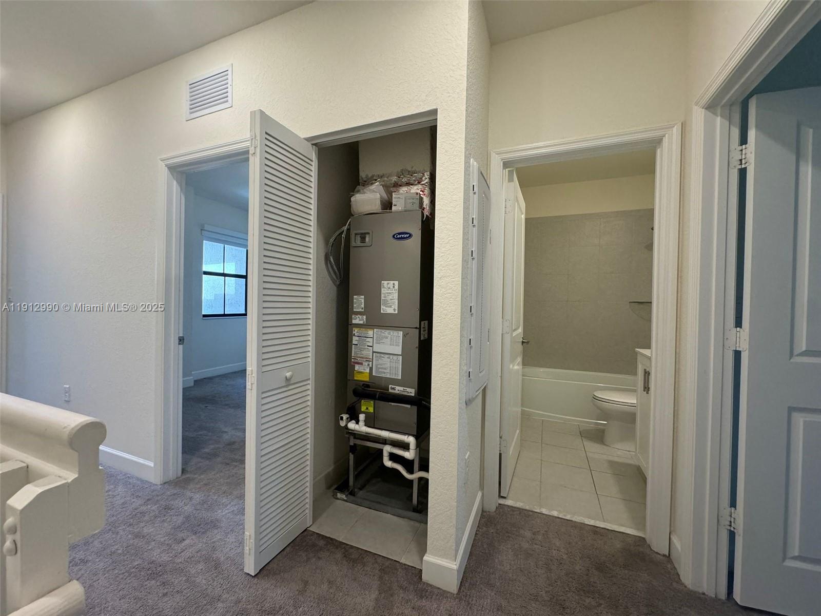 11325 West 34th Way Hialeah, FL 33018 - Photo 27 of 46 a bathroom with a shower and a sink