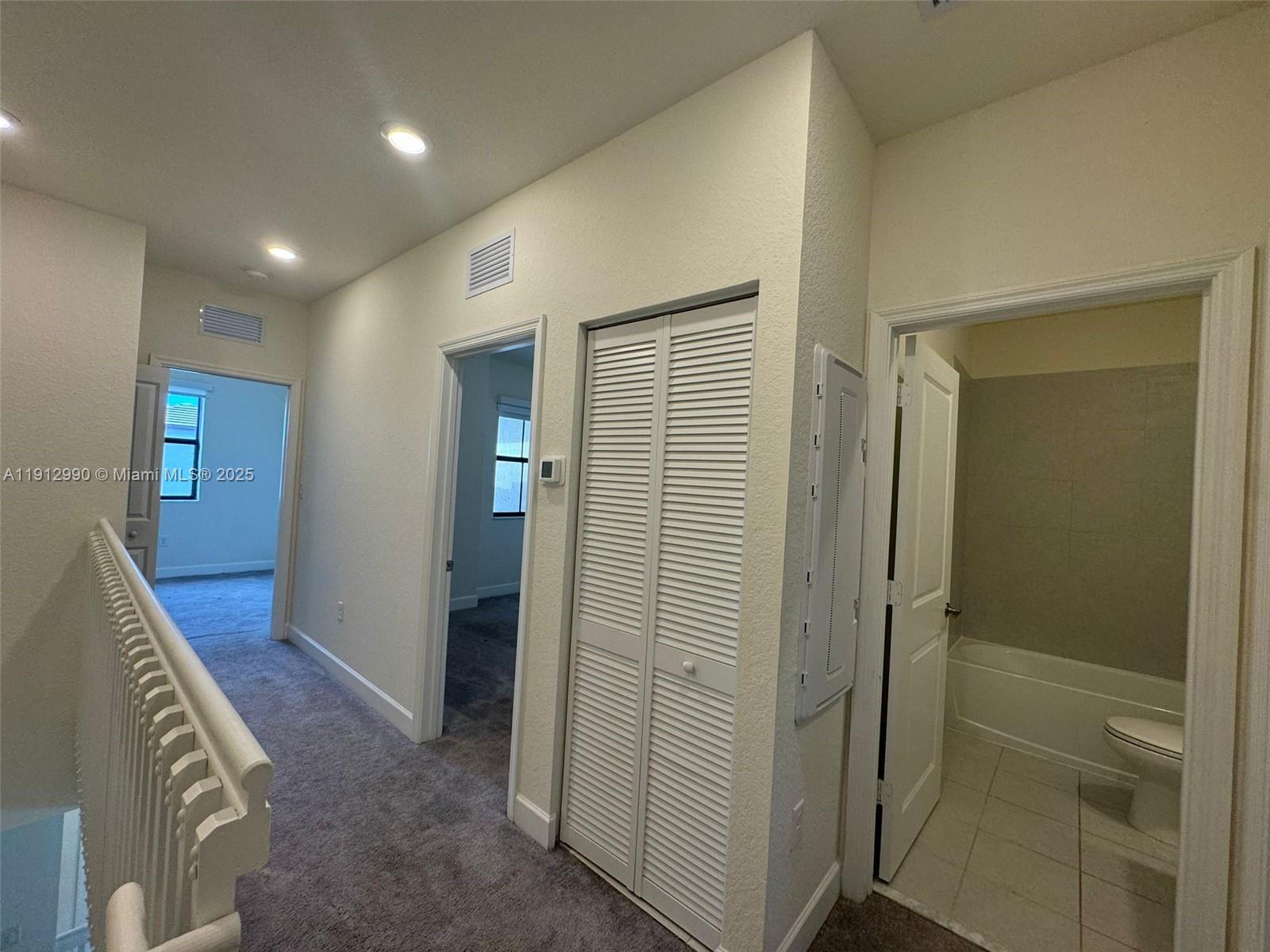 11325 West 34th Way Hialeah, FL 33018 - Photo 31 of 46 a view of a hallway with wooden floor