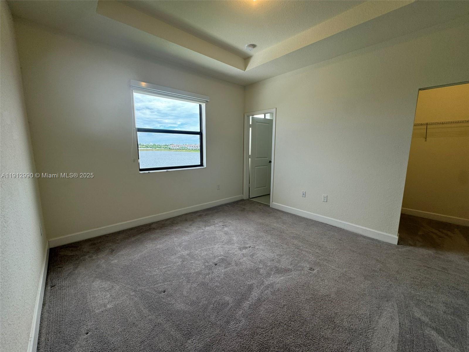 11325 West 34th Way Hialeah, FL 33018 - Photo 34 of 46 an empty room with windows