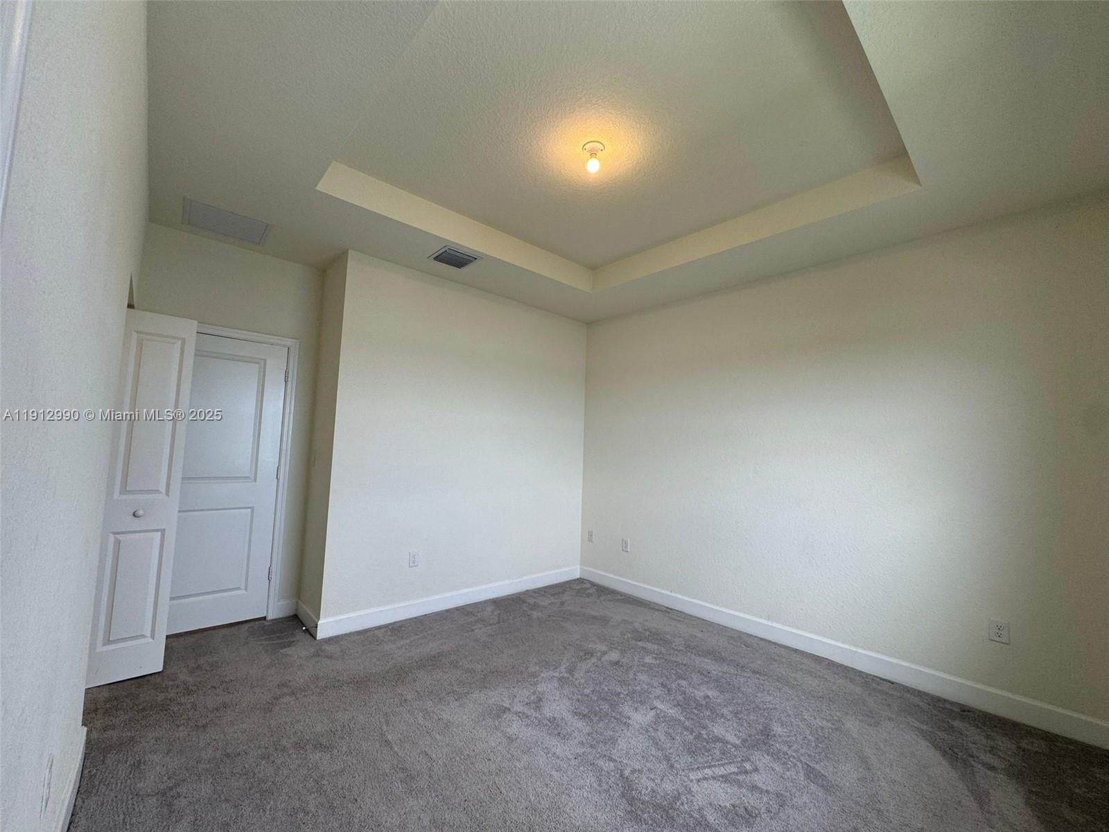 11325 West 34th Way Hialeah, FL 33018 - Photo 35 of 46 an empty room with closet