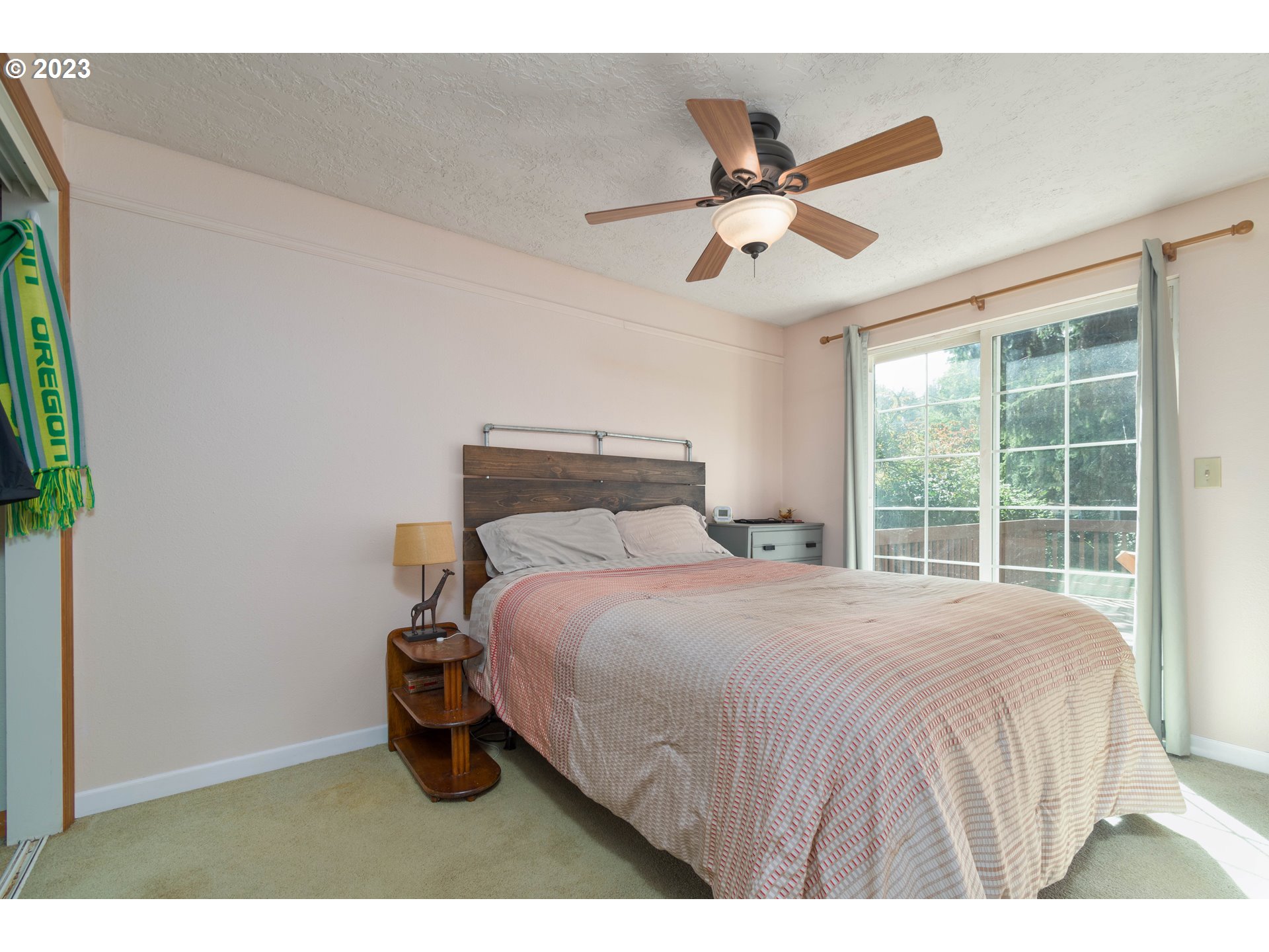 535 West M Street Springfield, OR 97477 - Photo 11 of 48 a bedroom with a bed and window