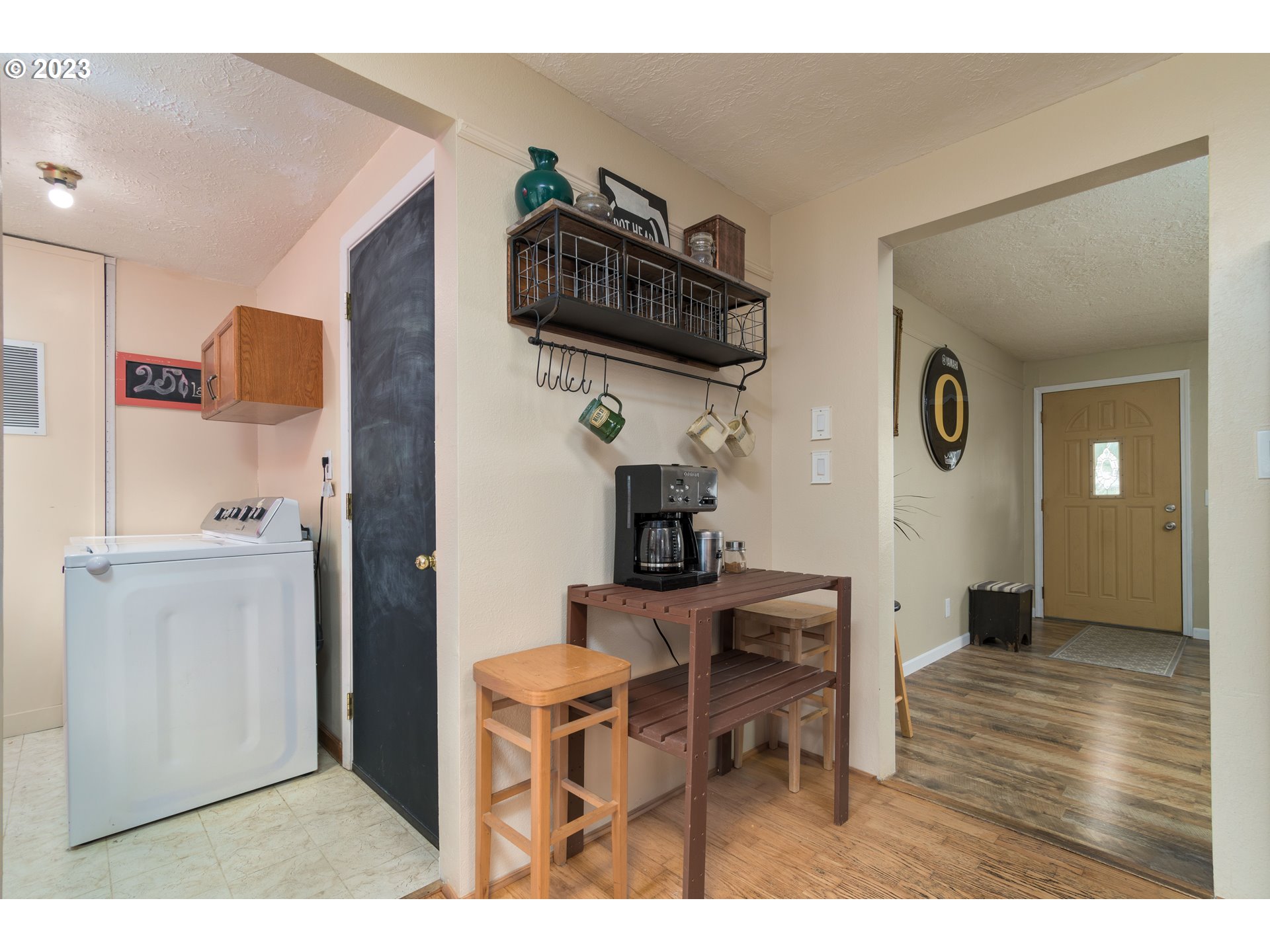 535 West M Street Springfield, OR 97477 - Photo 21 of 48 a kitchen view with granite countertop a refrigerator and a sink