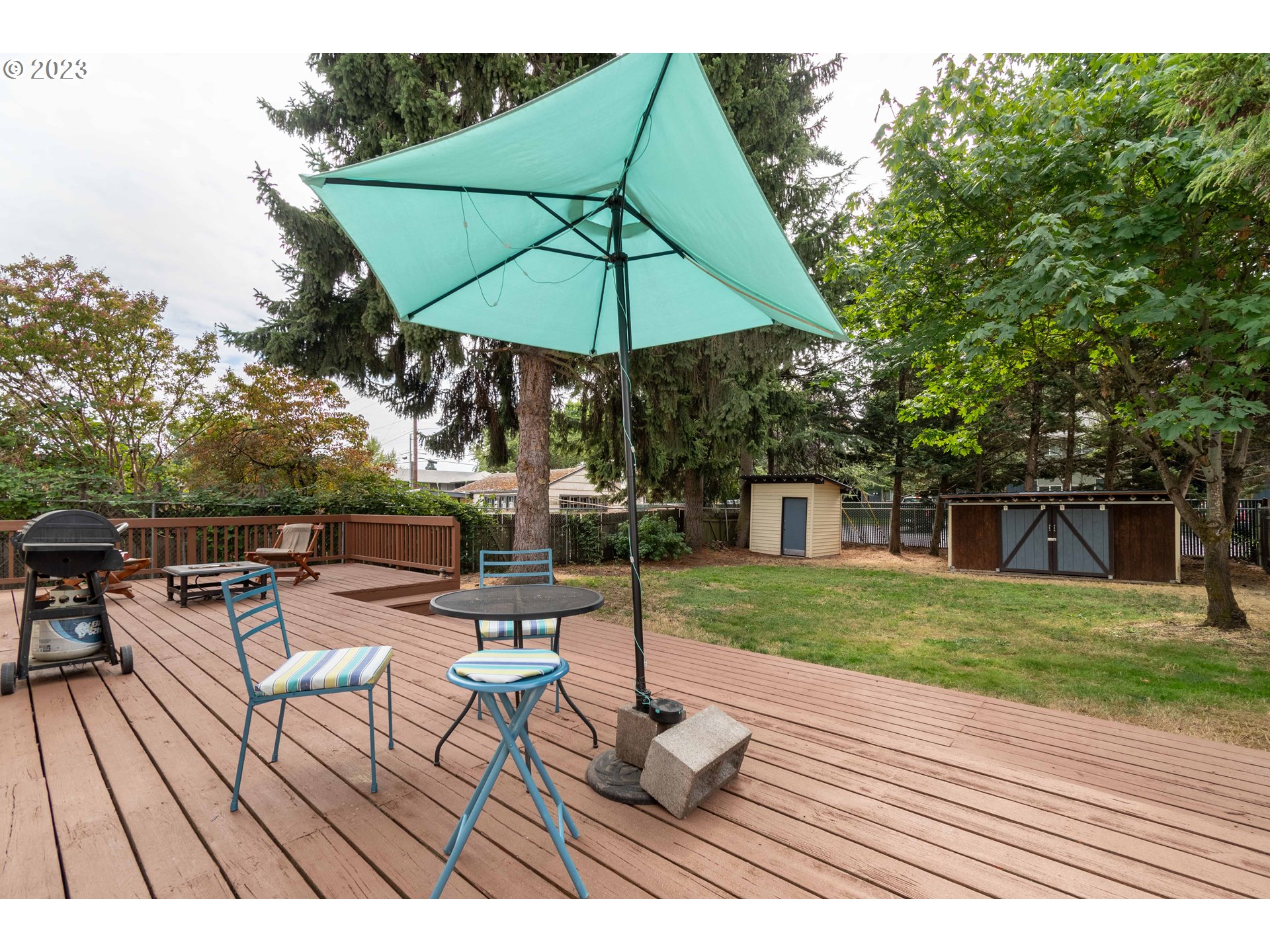 535 West M Street Springfield, OR 97477 - Photo 26 of 48 a view of a backyard with sitting area