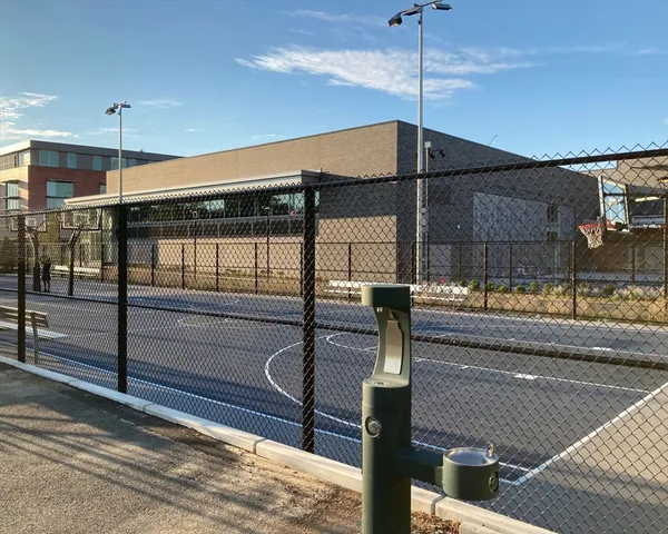 a view of a living room and kitchen