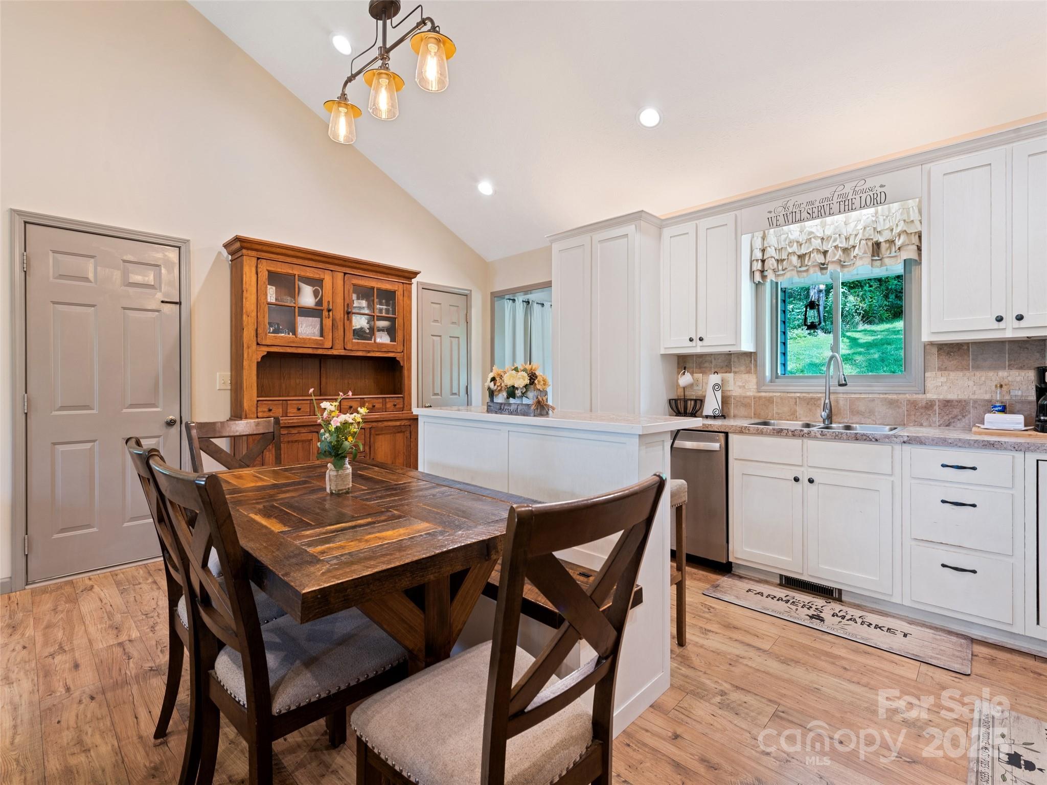 153 Trinity Drive Clyde, NC 28721 - Photo 19 of 38 a view of a dining room with furniture