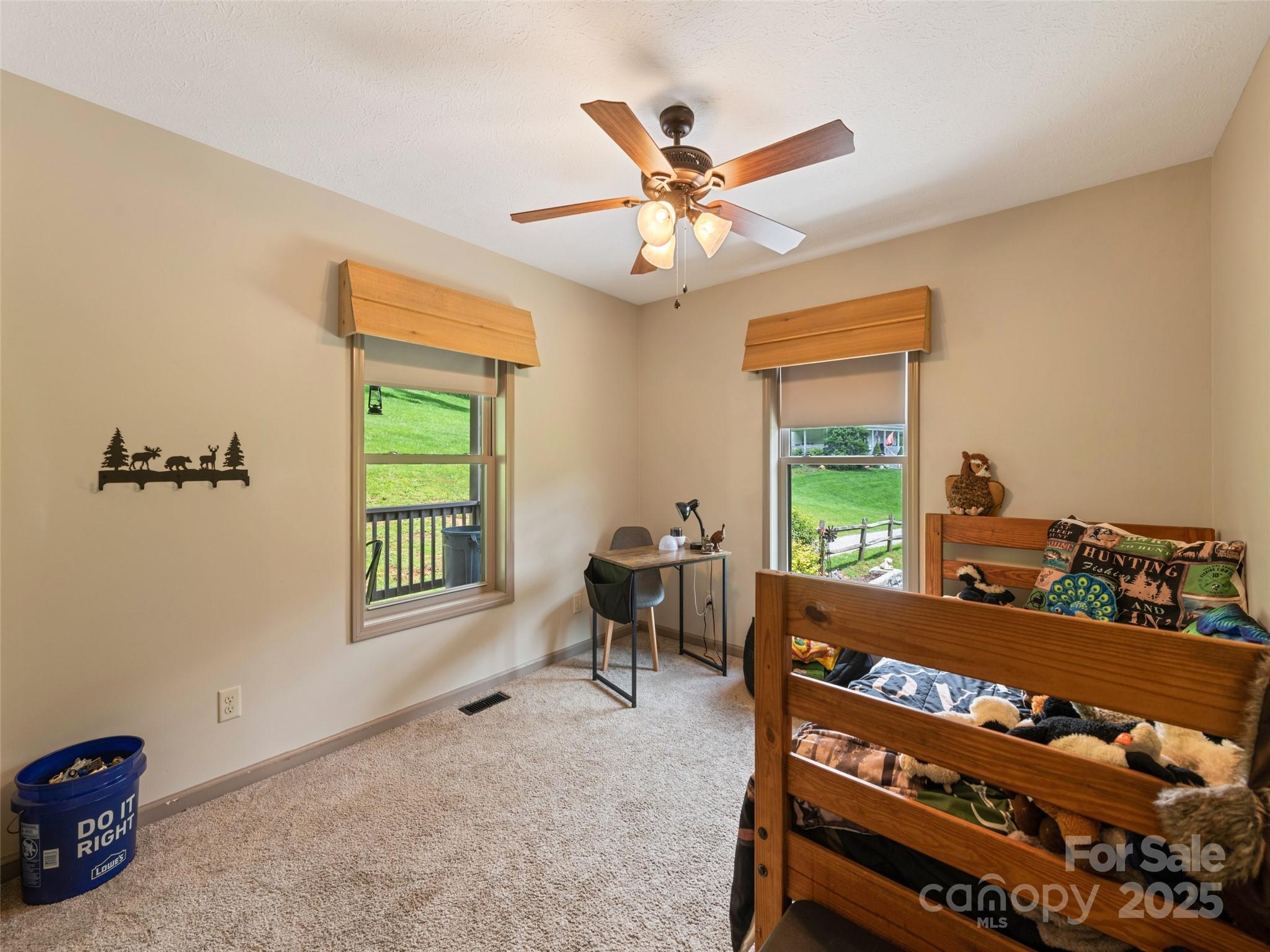 153 Trinity Drive Clyde, NC 28721 - Photo 36 of 38 a view of a workspace with furniture and a window