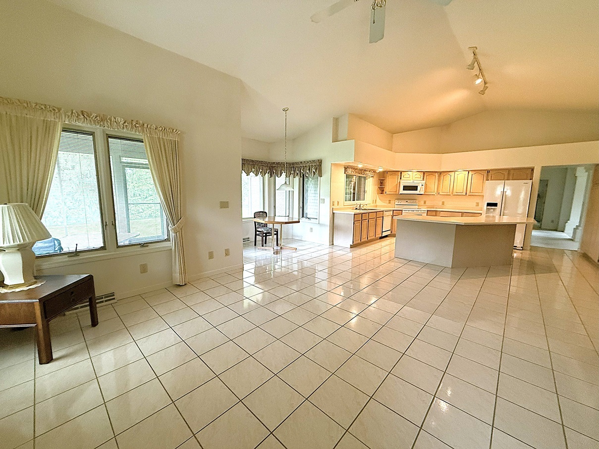 132 Fox Trot Dixon, IL 61021 - Photo 16 of 42 a living room with a large window and white walls