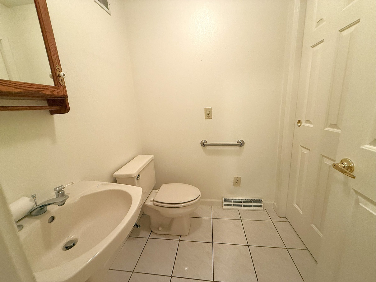 132 Fox Trot Dixon, IL 61021 - Photo 17 of 42 a bathroom with a toilet and a sink