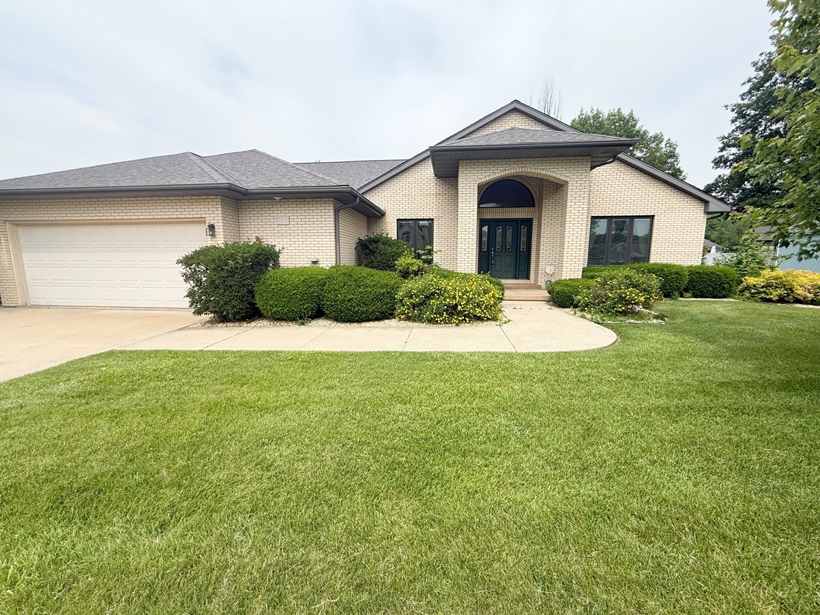 132 Fox Trot Dixon, IL 61021 - Photo 2 of 42 a view of a front of a house with a yard