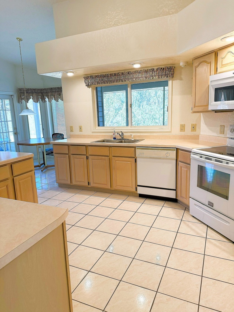 132 Fox Trot Dixon, IL 61021 - Photo 10 of 42 a kitchen with a sink a stove and cabinets