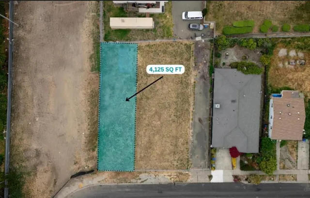 an aerial view of residential house with outdoor space