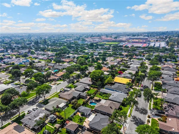 an aerial view of a city with lots of residential buildings