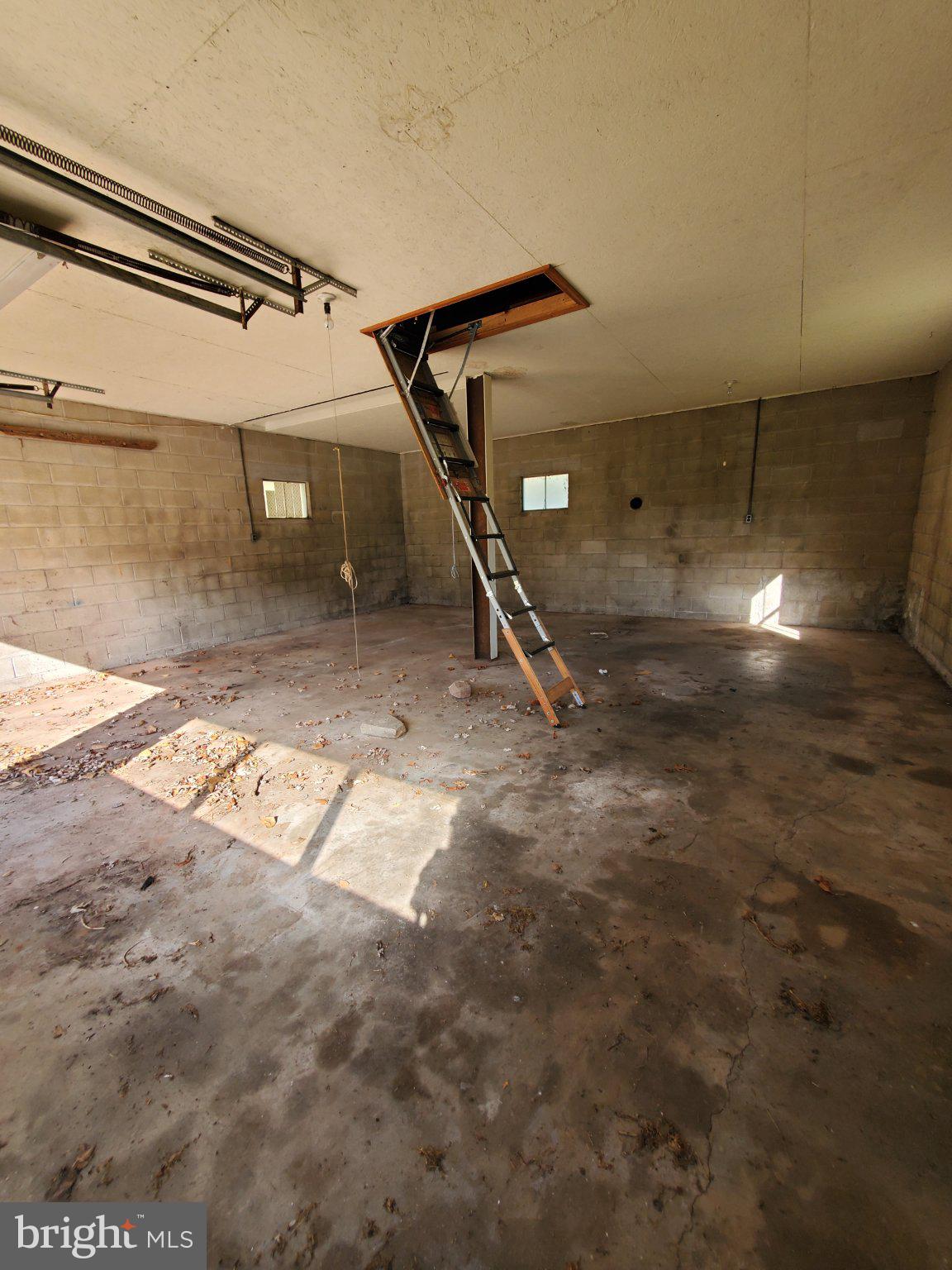 7881 Ford Hill Road Rio, WV 26755 - Photo 13 of 27 Spacious unfinished room with ladder access.