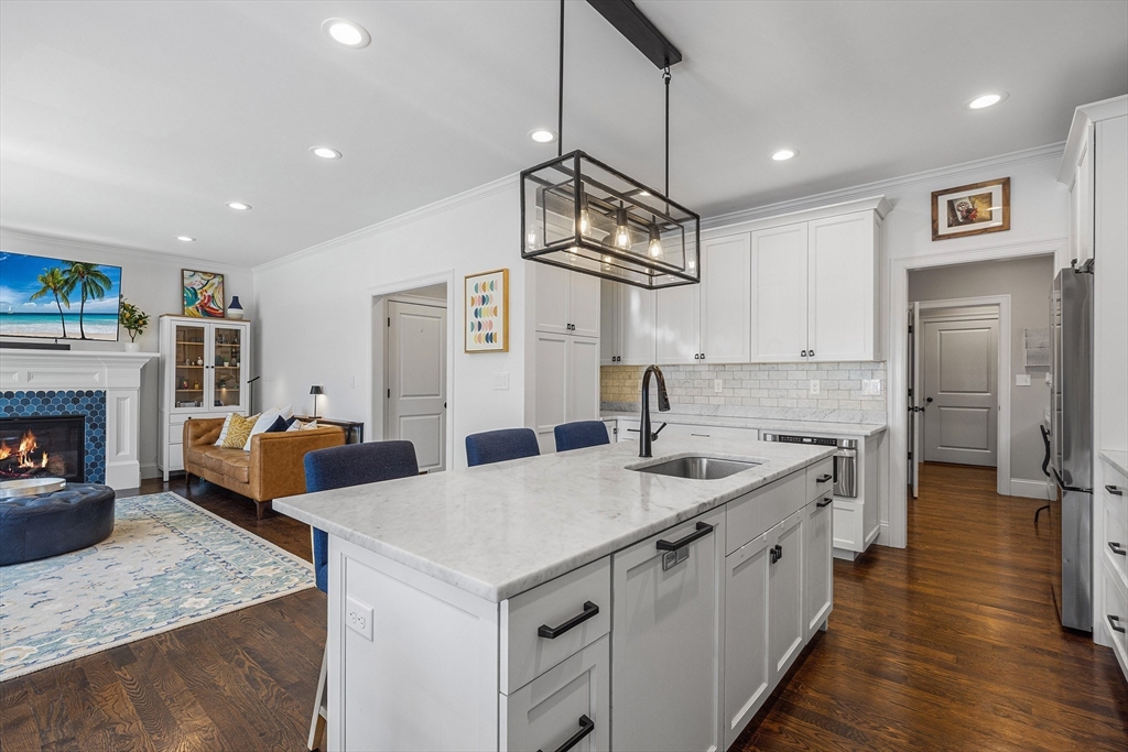 48 Hillcrest Road Waltham, MA 02451 - Photo 12 of 42 a kitchen with sink and refrigerator