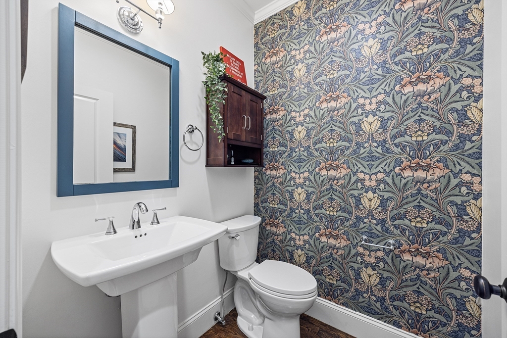 48 Hillcrest Road Waltham, MA 02451 - Photo 15 of 42 a bathroom with a sink toilet and mirror