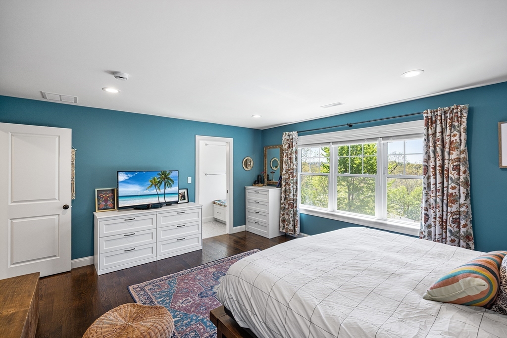 48 Hillcrest Road Waltham, MA 02451 - Photo 21 of 42 a bedroom with a bed and a dresser