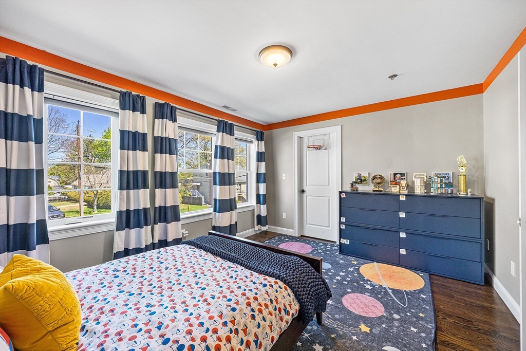 48 Hillcrest Road Waltham, MA 02451 - Photo 25 of 42 a bedroom with a bed and a window