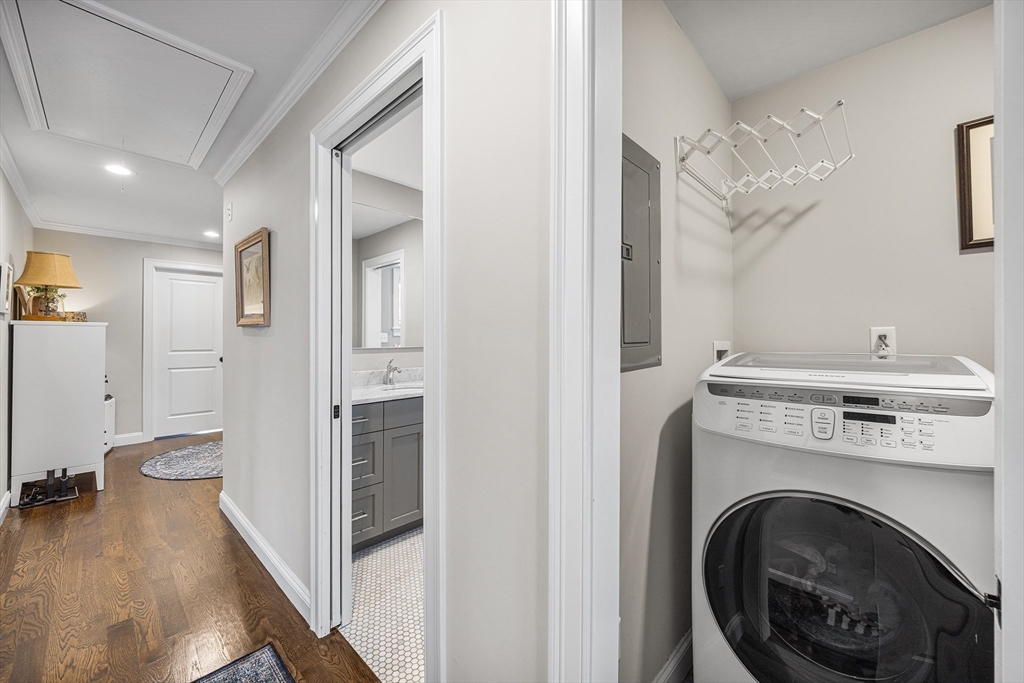 48 Hillcrest Road Waltham, MA 02451 - Photo 29 of 42 a view of a hallway with washer and dryer