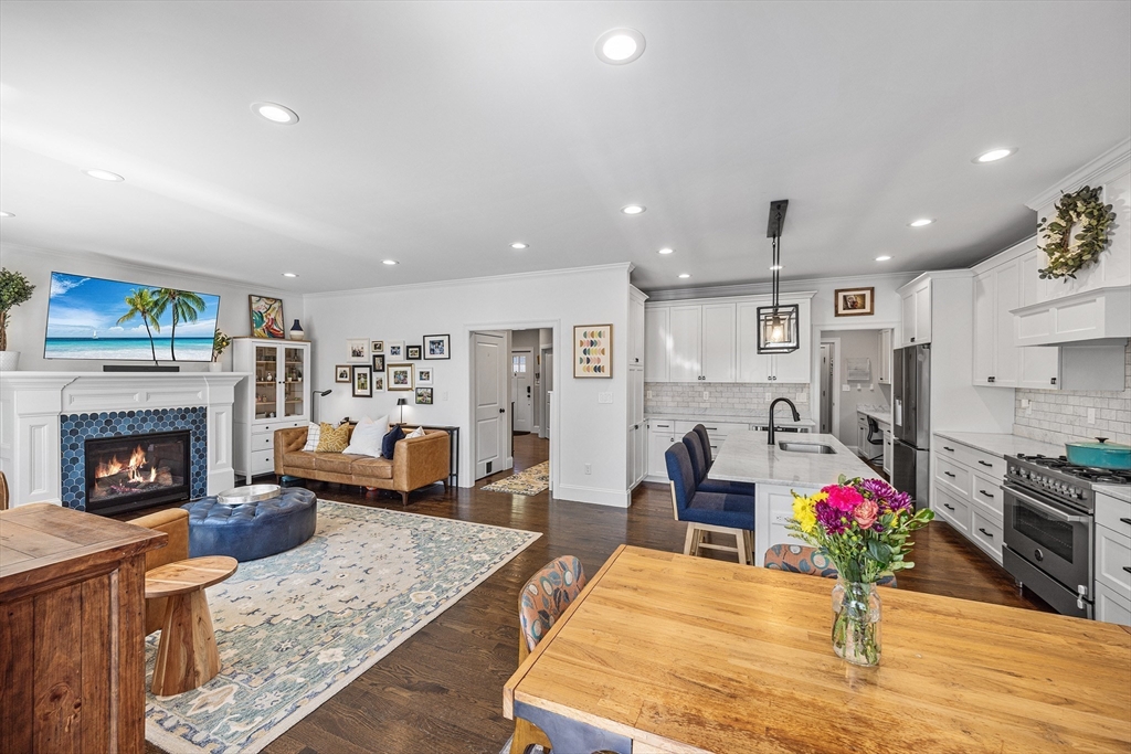 48 Hillcrest Road Waltham, MA 02451 - Photo 3 of 42 a living room with stainless steel appliances furniture fireplace and view kitchen